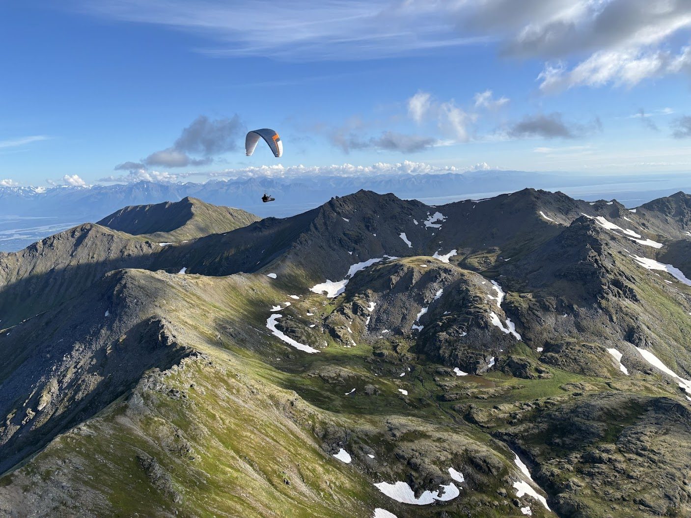 Paragliding over Alaska mountains near Hatcher Pass